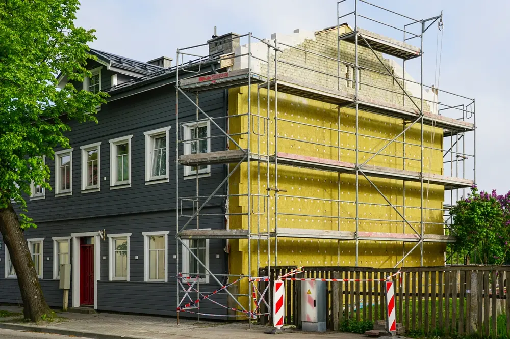 Travaux d'isolation thermique par l'extérieur conformes à la réglementation RT existant